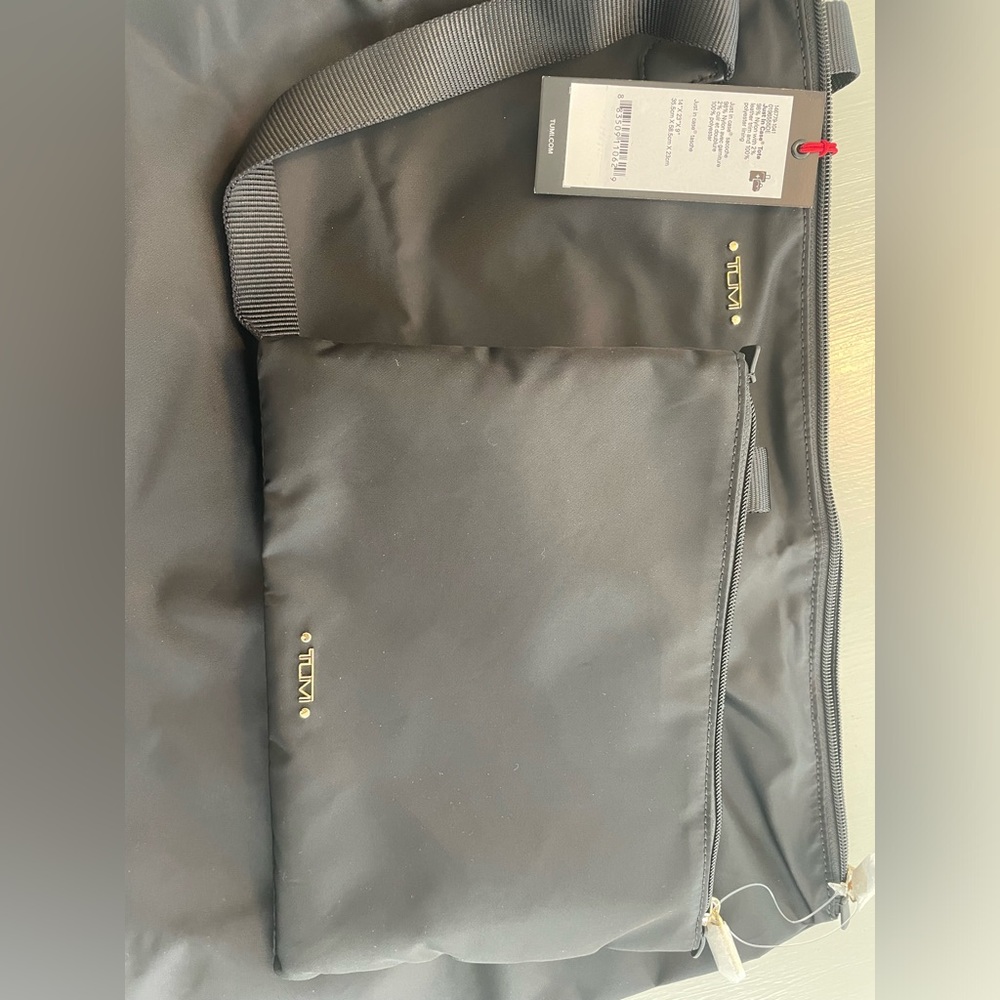 Tumi “Just In Case” black travel luggage bag